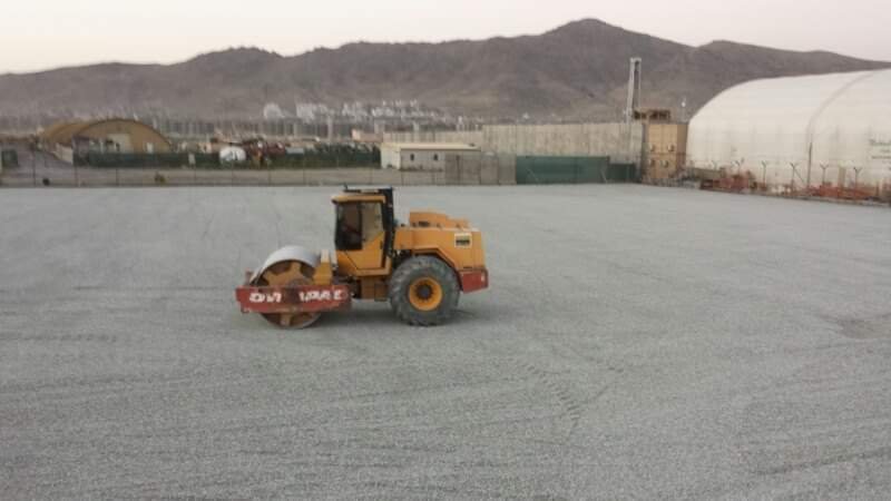 Road roller at an industrial site